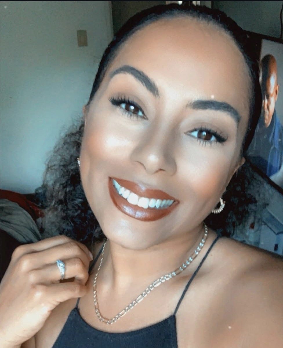 Current smiling portrait of Brittney J